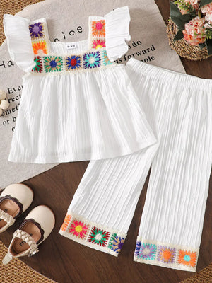 Children's Crochet Trimmed Top And Pants Set in White, side view