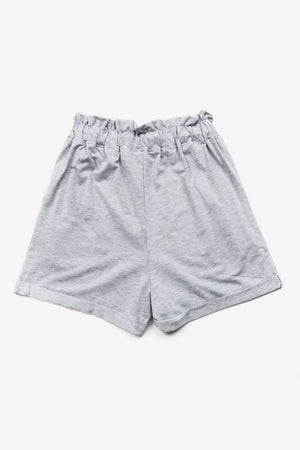 Light gray paperbag waist shorts with decorative buttons and a comfortable fit.