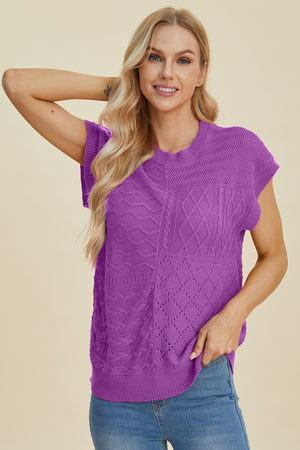 Purple knit patchwork top with varied textures and short sleeves.