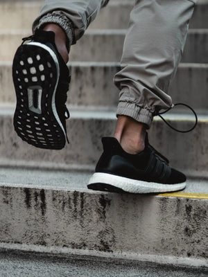 Tech-Utility Cargo Joggers in gray with drawstring ankle detail.