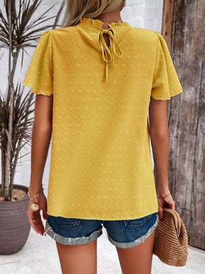 Yellow dotted swiss blouse with flutter sleeves and tie back detail