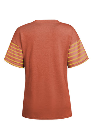 Orange raglan tee with yellow striped sleeves and side slits