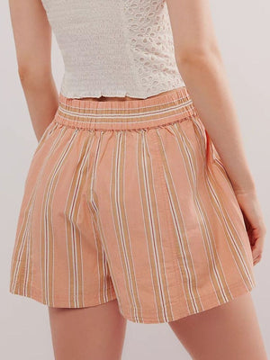 Peach striped shorts with elastic waistband and white top