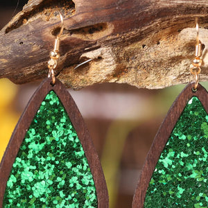 Wood-framed green glitter teardrop earrings with gold hooks