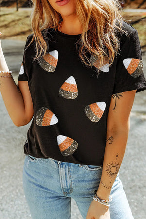 Black t-shirt with all-over candy corn sequin embellishments.