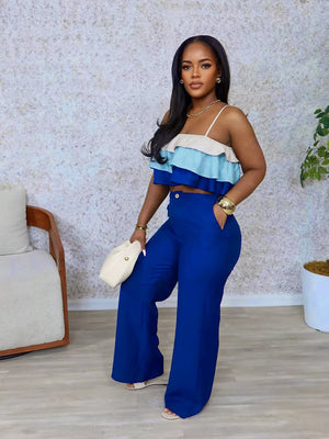 Chic layered ruffle crop top with blue wide-leg pants set.
