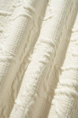 Ivory crewneck sweatshirt with embossed geometric texture