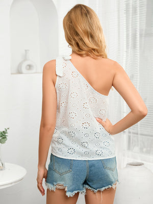 White eyelet one-shoulder top with bow detail and floral cutouts