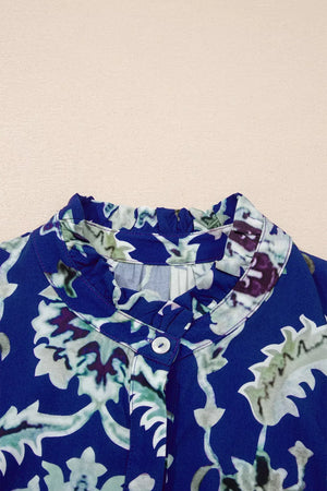 Vibrant floral maxi dress with buttoned frilled collar and blue base