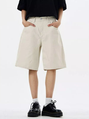 Off White chino shorts with drawstring waist and relaxed fit.