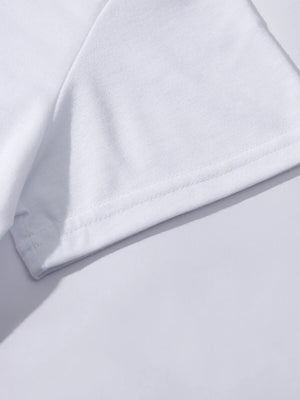 White t-shirt hem detail with visible stitching