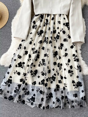 Maternity midi dress with black floral overlay and matching blazer.