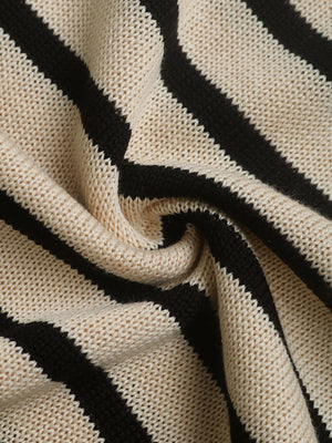 Nautical stripe acrylic sweater in pastel yellow with button shoulder detail.