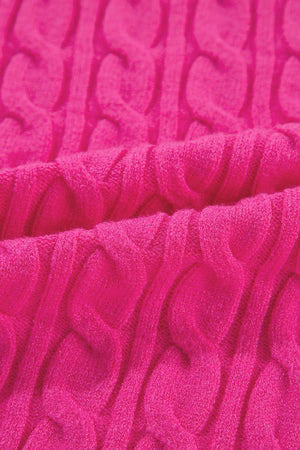 Hot pink cable knit sweater with a mock neck detail.
