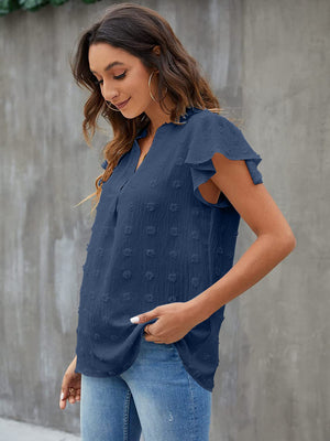 Dark blue textured voile blouse with flutter sleeves and V-neck.