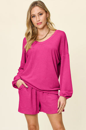 Hot Pink waffle knit lounge set with blouson sleeves and shorts.