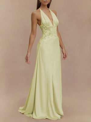 Light Yellow lace trim halter neck maxi dress with deep V-neck and fitted waist.