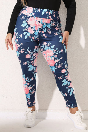 Floral Bloom Sculpt Legging in Peacock Blue with pink and blue floral print.