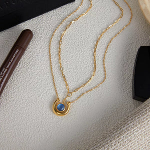 Elegant gold-plated layered necklace with blue stone pendant