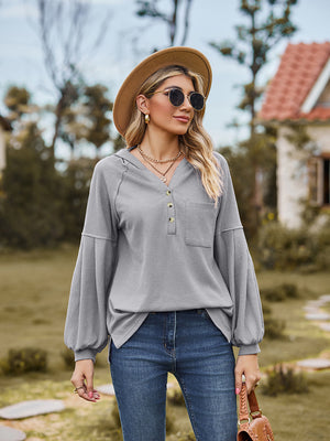 Gray ribbed henley hoodie with balloon sleeves and button detail