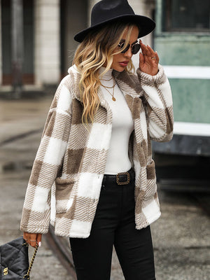 Textured plaid teddy button-up jacket in khaki and white with two front pockets.
