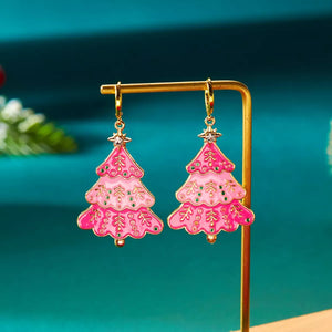 Christmas tree dangle earrings in blush pink with festive details and gold accents.