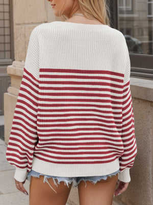 Horizontal stripe drop shoulder knit sweater in cream and burgundy with balloon sleeves.