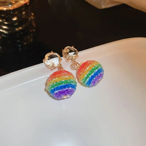Rainbow orb crystal drop earrings with gold alloy posts and clear faceted gems.