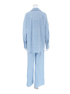 Blue and white striped pajama set with button-up shirt and wide-leg pants.