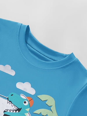 Toddler blue t-shirt with a graphic dinosaur adventure print and clouds.