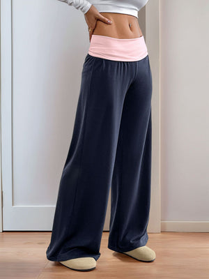 Navy palazzo pants with a pink contrast waistband