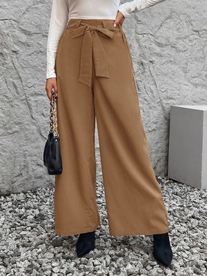 Belted palazzo trousers in caramel polyester with a fluid drape and tie waist.