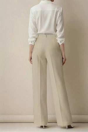 Beige high-waisted wide-leg trousers with a relaxed fit.