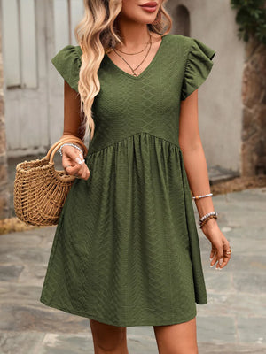 A-line dress in Bean Green with ruffled cap sleeves and v-neck.