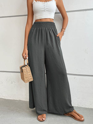 Dark Gray textured smocked waist palazzo maternity pants with wide legs.