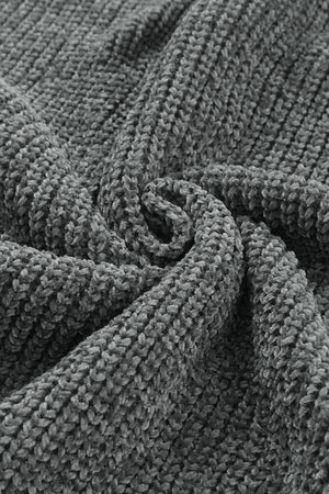 Distressed knit sweater in dark gray with a plush, textured fabric detail.