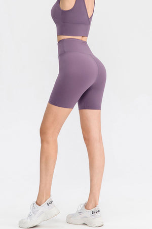 Mauve bike shorts with a high waist and sculpting fit.