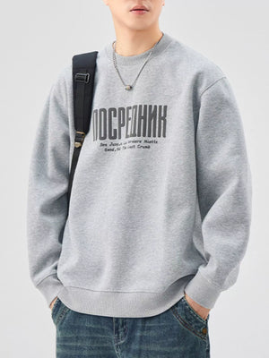 Oversized graphic sweatshirt in Floral Gray cotton blend with crewneck and ribbed cuffs.