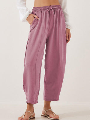 Textured seamed balloon crop trousers in Moonlit Mauve with drawstring waist and pockets.