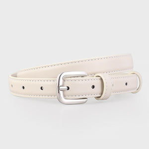 Timeless skinny belt in ivory cowhide leather with silver buckle and keeper loop.