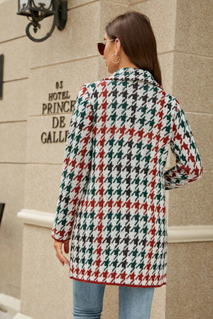 Grid-print knit blazer coat in white, red, green, and black houndstooth pattern.