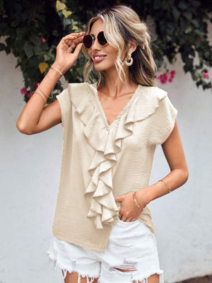 Beige flutter sleeve V-neck blouse with cascading ruffles.