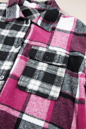 Colorblock plaid shacket with button-flap pocket and collar detail.