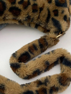 Leopard print faux fur shoulder bag with gold hardware detail.