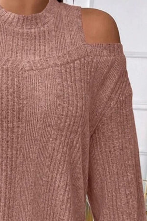 Ribbed mock neck cold shoulder top in dusty pink with a textured knit.