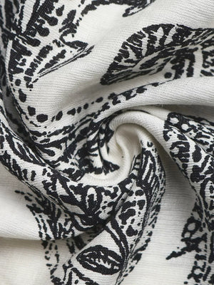 Paisley print maternity maxi dress fabric detail in black and white.