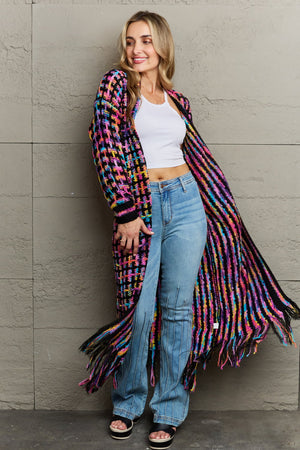 Chromatic crochet maxi cardigan with fringe, featuring a multi-color plaid pattern and acrylic material.
