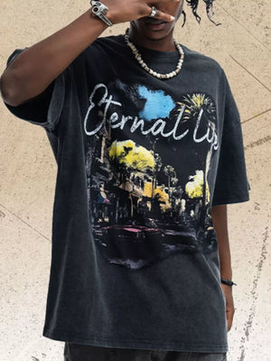 Black cotton graphic tee with "Eternal Life" text and vintage street scene print