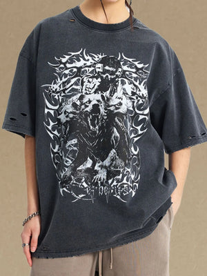 Black oversized graphic tee with distressed details and wolf artwork.