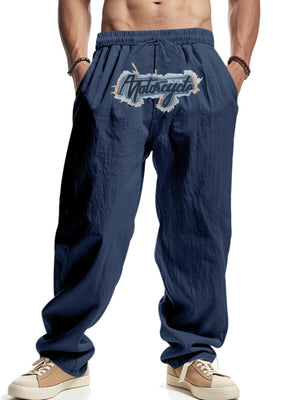 Navy blue men's sweatpants with drawstring and motorcycle graphic detail.